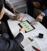 business-people-working-with-ipad-high-angle